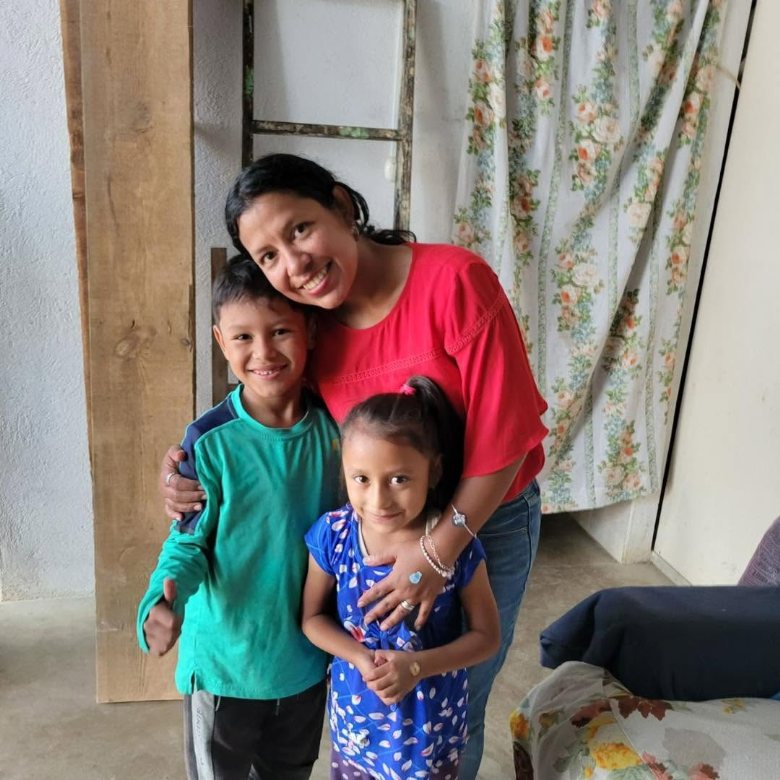 A mother and her children at home